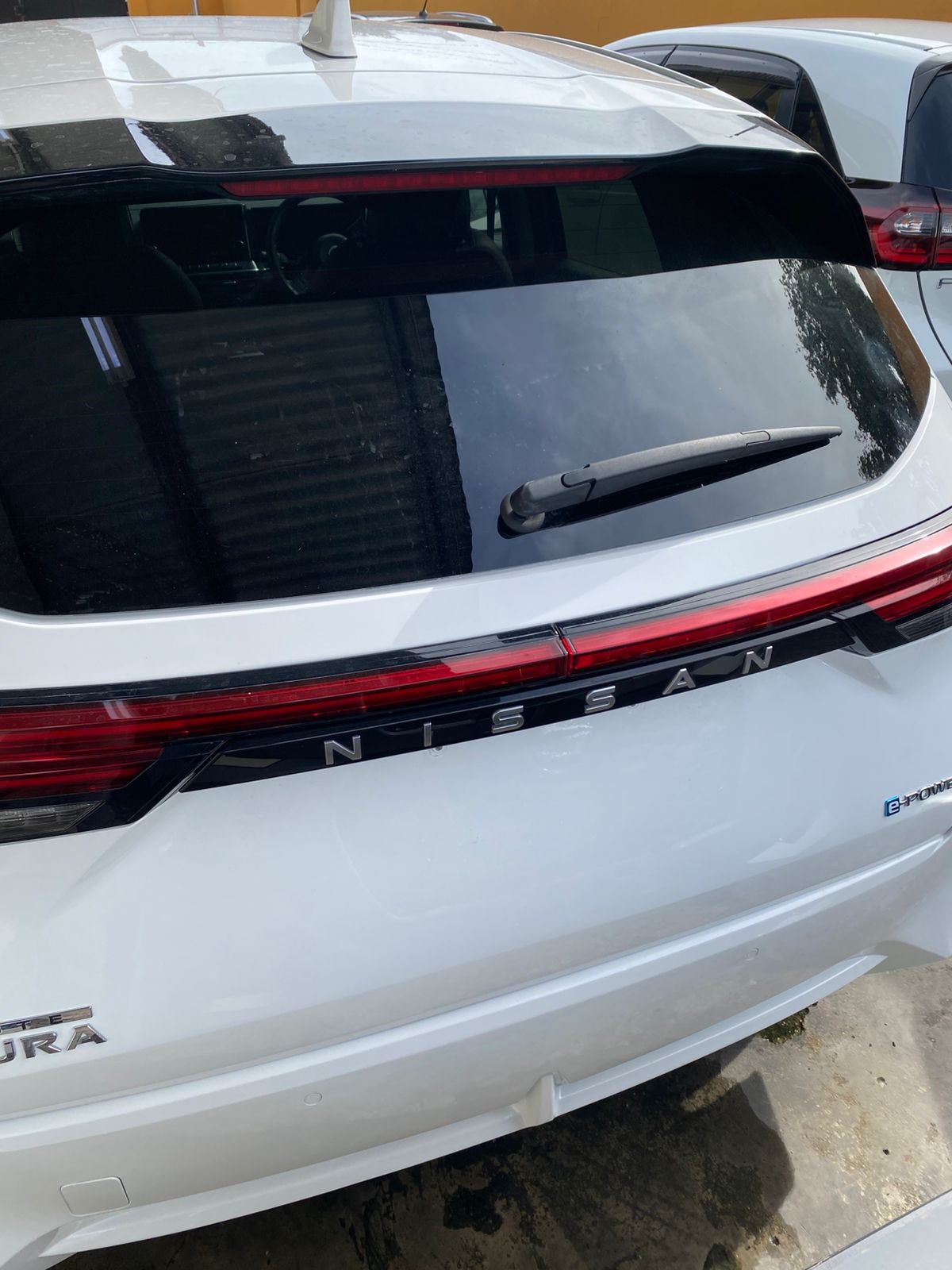 2024 White Nissan Aura