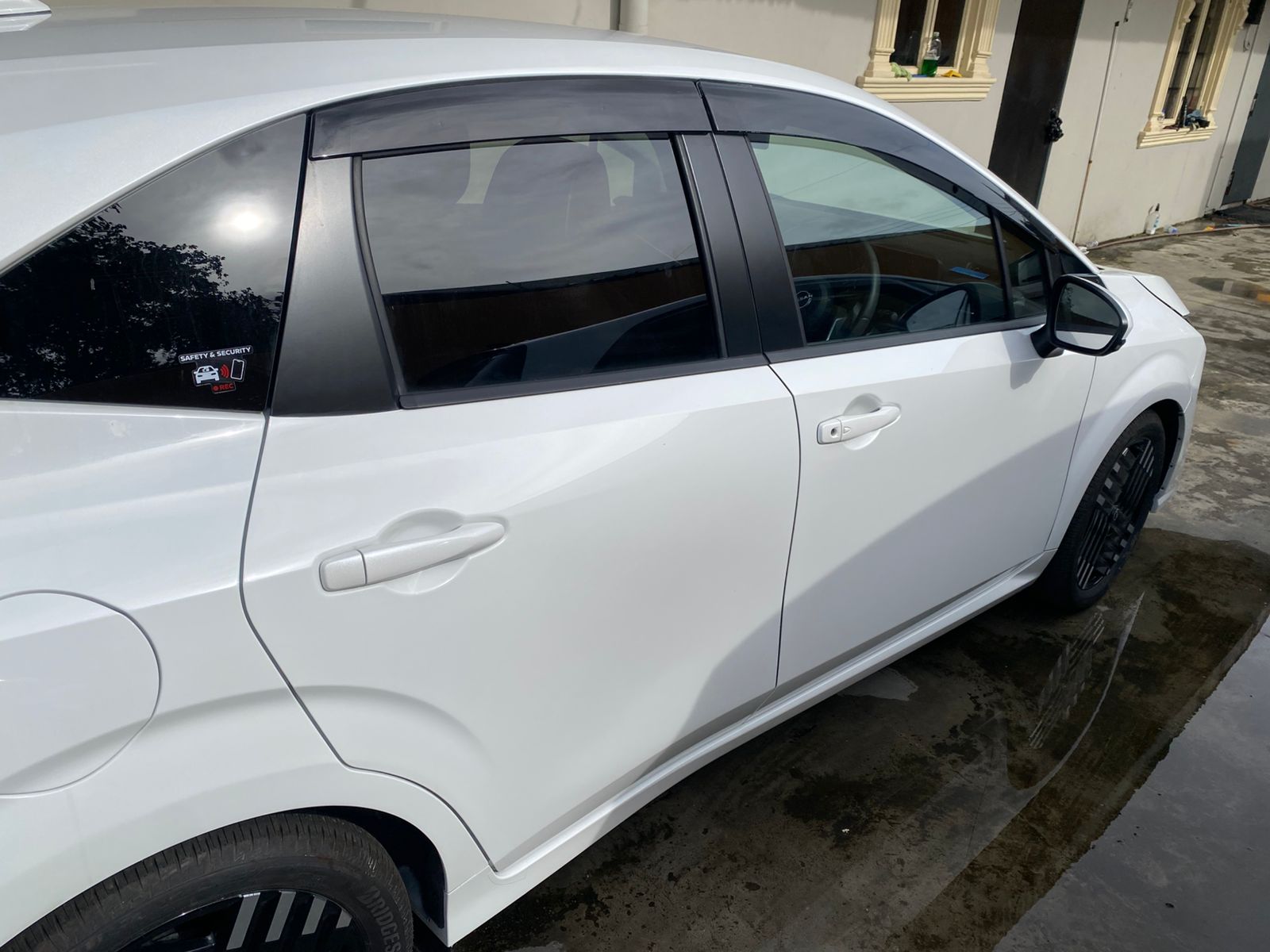 2024 White Nissan Aura