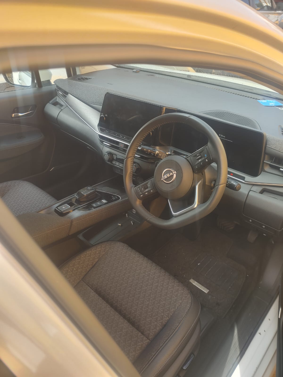 2024 White Nissan Aura