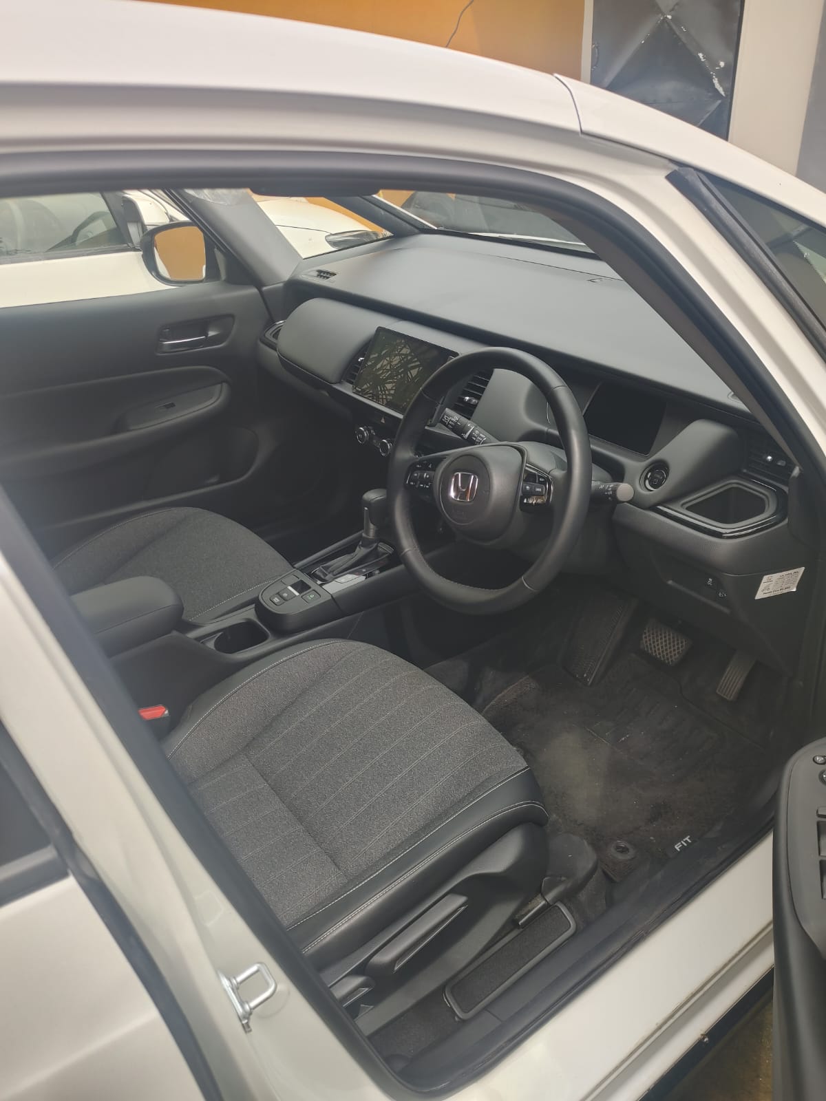 2024 White Honda Fit Deluxe