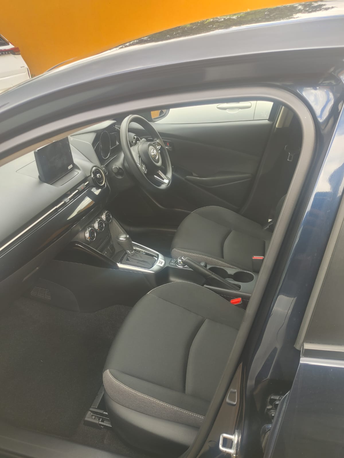 2023 Midnight blue Madza 2 Gasoline